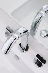 closeup of modern glossy water tap.