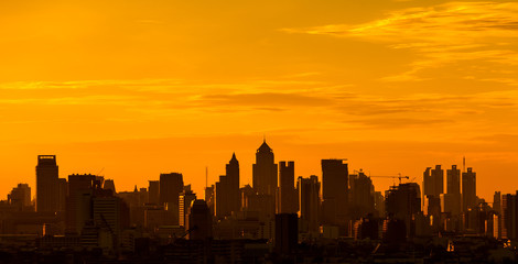 Fototapeta na wymiar City silhouette against the sky on a sunset. Bangkok city.