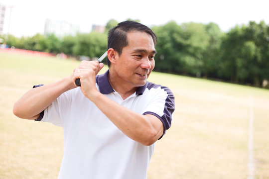 man playing golf