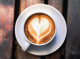 cup of coffee in coffee shop, vintage color tone