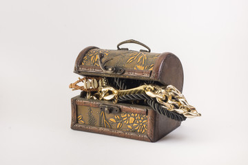 Chest full of gold, isolated. White background