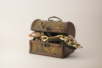 Chest full of gold, isolated. White background