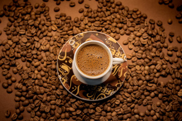 Coffee cup with beans