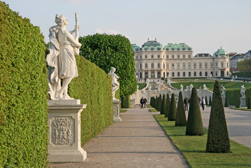 VIENNA, AUSTRIA - APRIL 22, 2010: Statues in Belvedere Palace garden in Vienna, Austria - obrazy, fototapety, plakaty