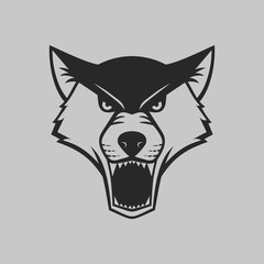 The wolf bares its teeth. Wolf head logo or icon in one color. Vector illustration
