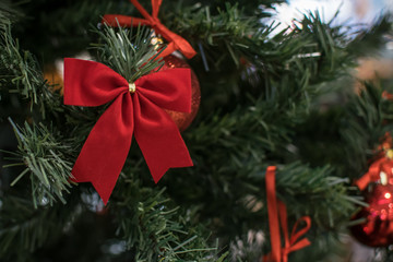 Fototapeta na wymiar Christmas-tree toy on a snowy branch, beautiful Christmas toy.