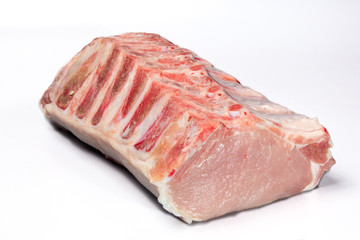 Fototapeta premium Pork loin on the bone on a white background, isolated.
