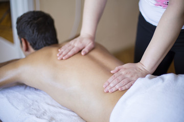 Fototapeta na wymiar Young man having a massage