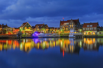 Fototapeta na wymiar Waterfront of Volendam on Christmas night, The Netherlands