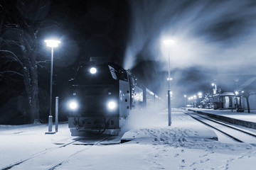 Steam locomotive ready to go in snow storm, Germany