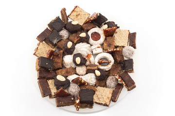 Different delicious cakes on a plate