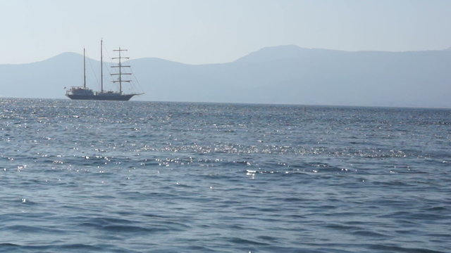 Sailing vessel anchored in the sea.