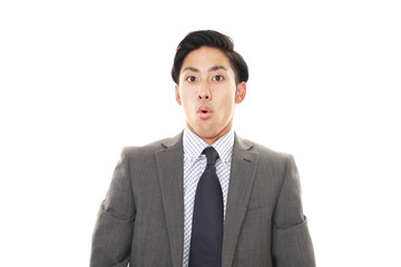 驚いた表情のビジネスマン