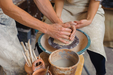 Potter teaches how make clay pot