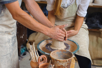 Potter teaches how make clay pot