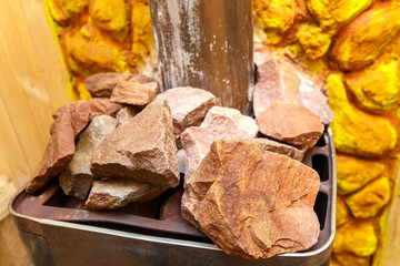 Photo of granite stones on sauna stove