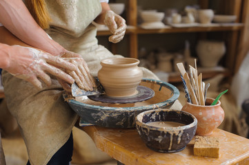 Potter teaches how make clay pot