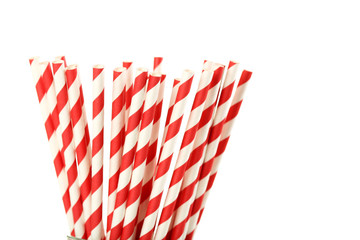 Striped drink straws on a white background