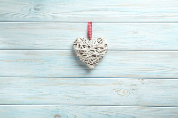 Love heart on a blue wooden background