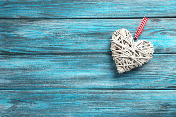 Love heart on a blue wooden background
