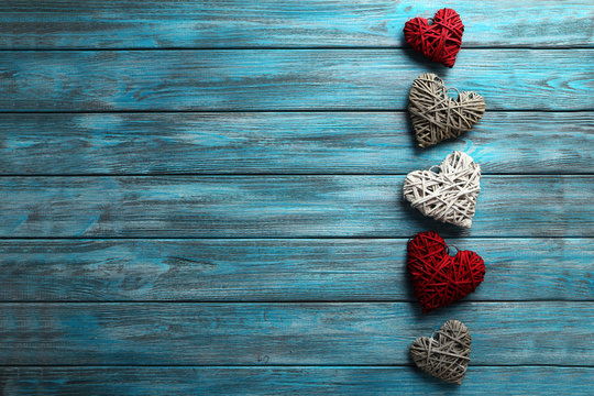 Love hearts on a blue wooden background