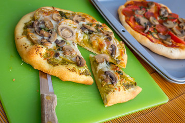 Freshly baked artisan pizza with fresh produce and cheese.