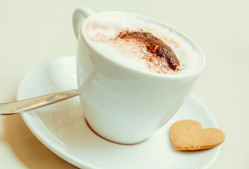 Cup of cappuccino coffee