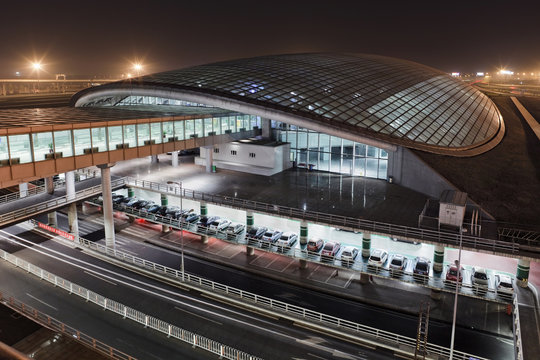 View on the railway station at Beijing Capital Airport Terminal 3 at night