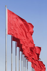 Line of red Chinese flags, symbol of communism