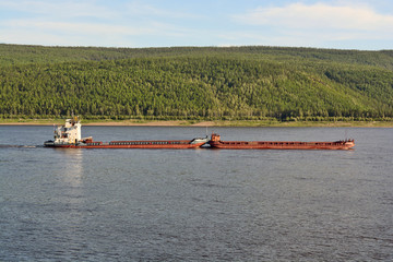 barge going down the river Lena