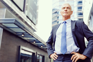 Portrait of confident businessman outdoors