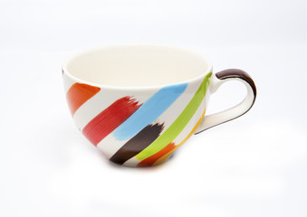 Close up of a beautiful cup on white background.