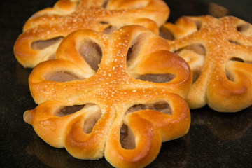  Taro bread with sesame on black  background