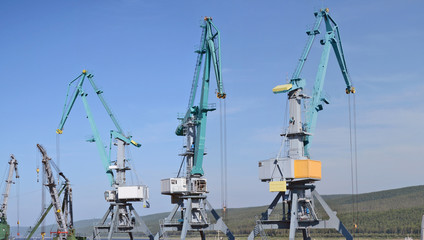 Fototapeta na wymiar harbor cranes