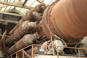 Fototapeta na wymiar Old cement production equipment
