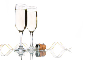 Glass of champagne with ribbon, celebration holiday