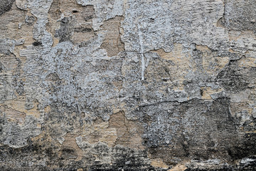 Textured walls with dirt.