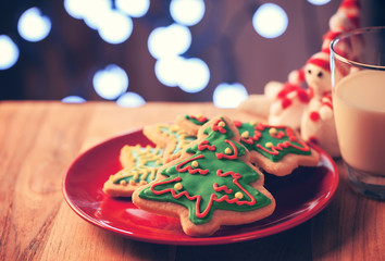 christmas tree cookies in red plate for the night