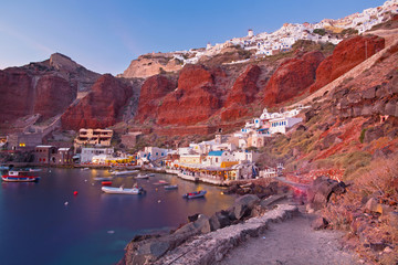 Santorini - The harbor of Oia in evening light.