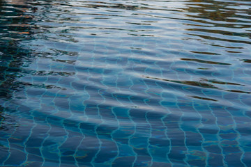 Dark blue ripped water in swimming pool