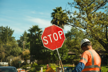 Construction worker with stop sign