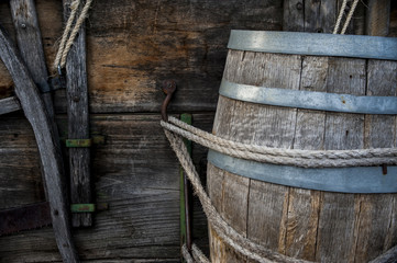 Water barrel attached with rope on pioneer wagon 