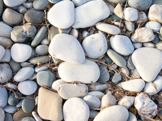 Pebble stones on coastline 
