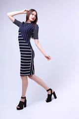 high fashion portrait of young elegant woman. Studio shot