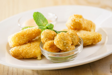 fried cheese with sauce