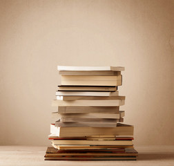 A stack of books with vintage background