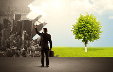 Salesman painting tree instead of city