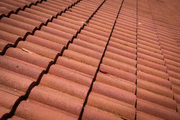 brown tile roof weathered on building residential