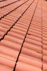 brown tile roof weathered on building residential