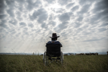 Lonely disabled man in wheelchair